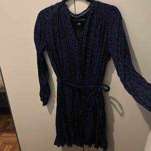 Never worn and tag is missing. Leopard print blue/black.